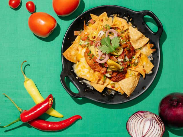 Rico Taco_Corn chips topped with Mozzarella, pulled pork with chipotle BBQ sauce & pico de gallo_menu_image