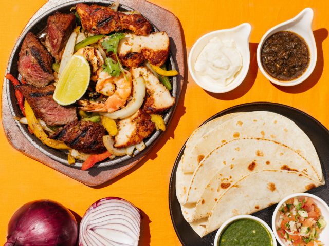 Rico Taco_Fajitas with grilled prawns, chicken breast, steak with bell peppers & onion_menu_image